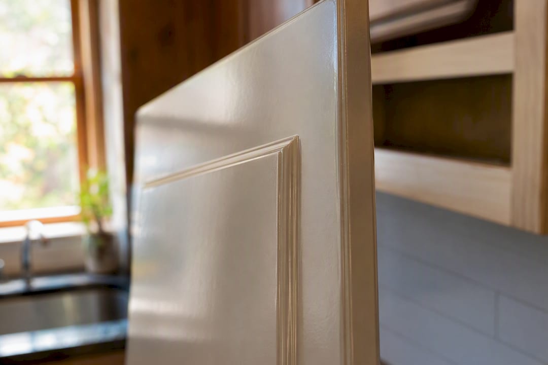 Close-up of thermofoil cabinet door surface and edge