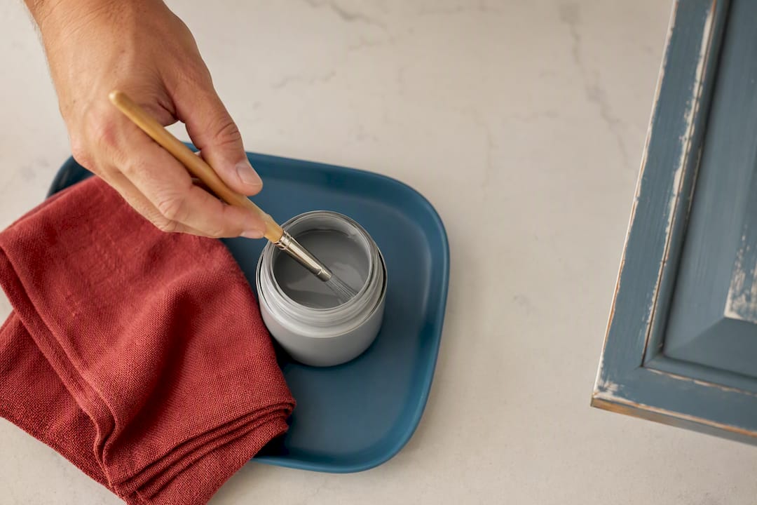 Fine brush and paint jar for cabinet touchups