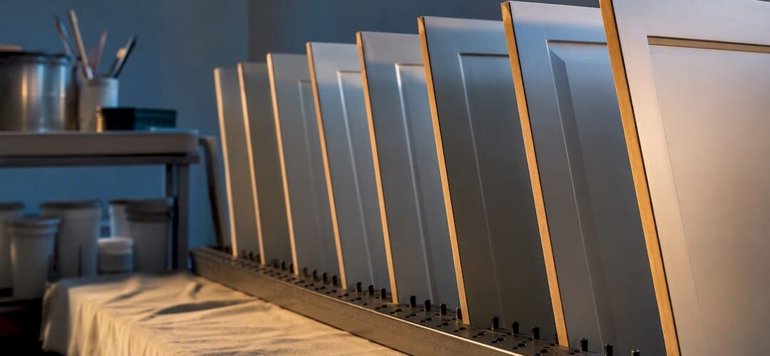 Cabinet doors curing on a drying rack