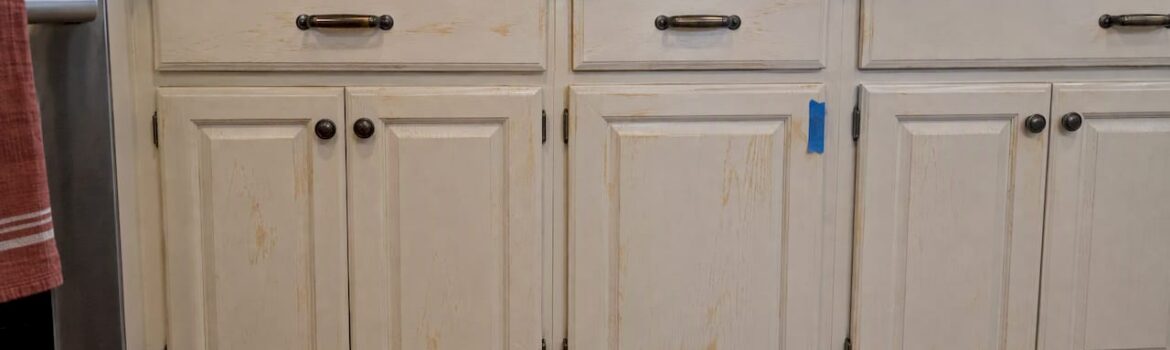 Amber tannin stains showing through painted cabinet doors