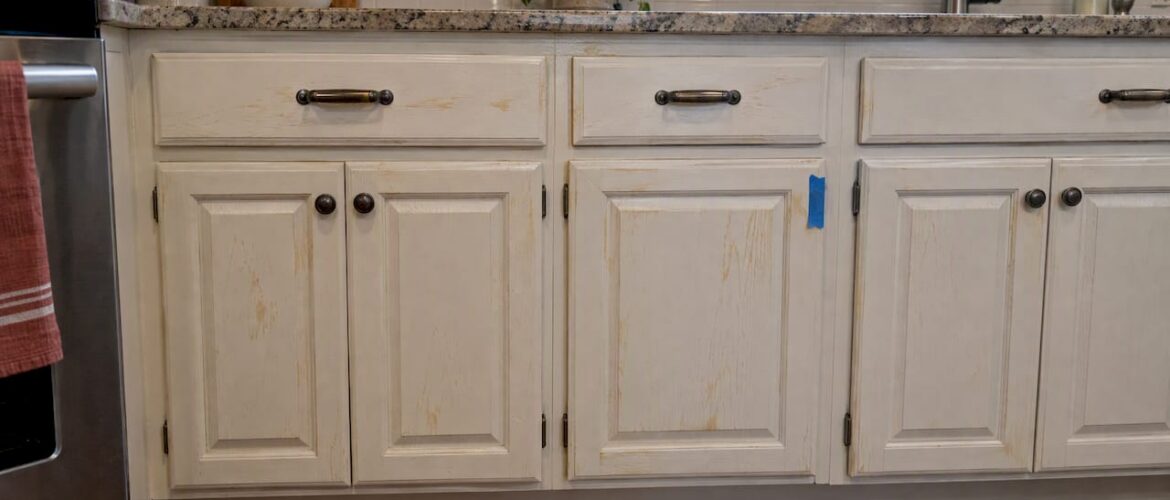 Amber tannin stains showing through painted cabinet doors